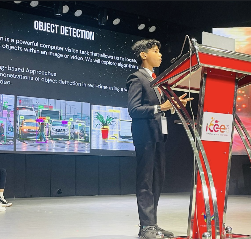 Riza Mohamed presenting Object Detection talk at stage event