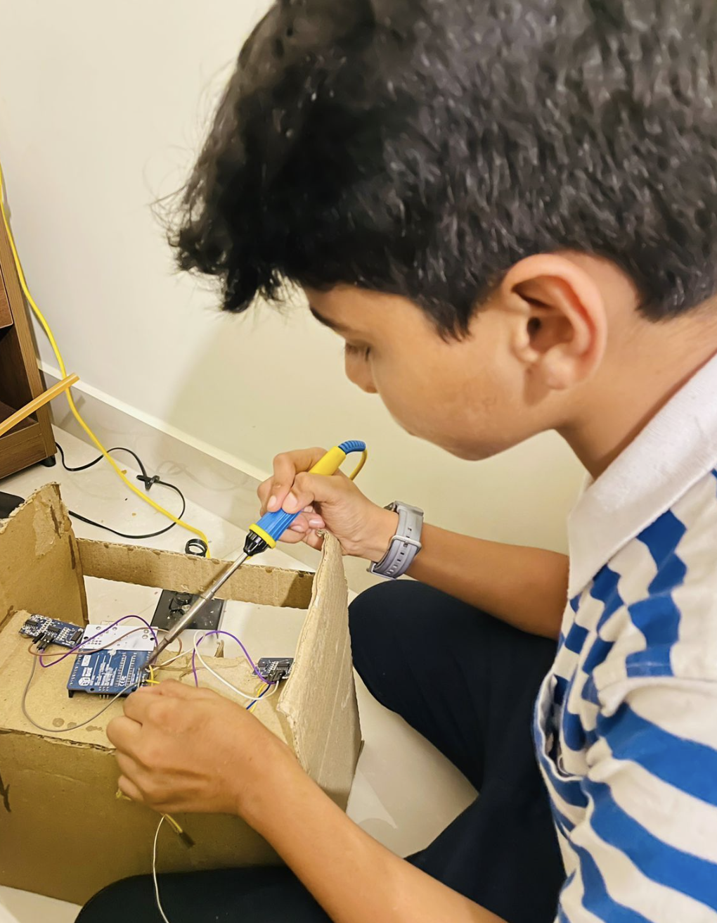 Riza Mohamed soldering building hardware electronics project