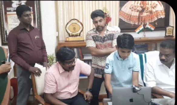 Riza Mohamed demonstrating project to government officials Kerala India