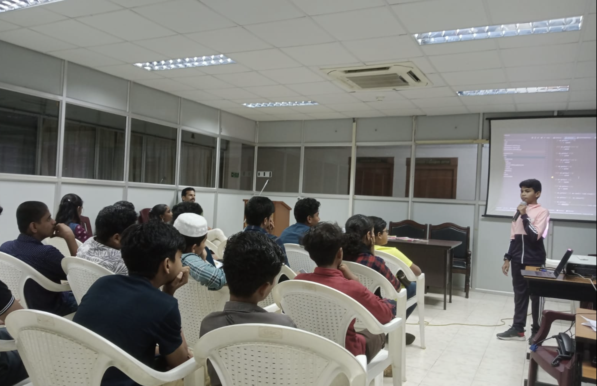 Riza Mohamed teaching Python programming workshop students Kerala India